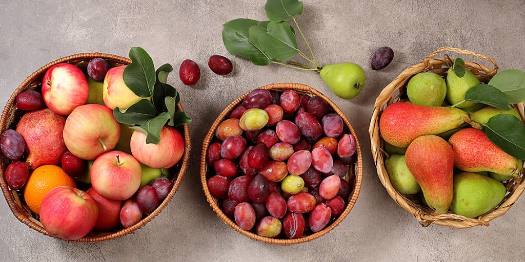fruits in bowls (apples, grapes, pears)
