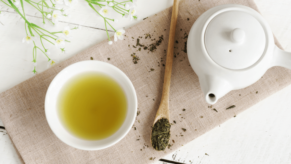 tea pot and tea on a cutting board