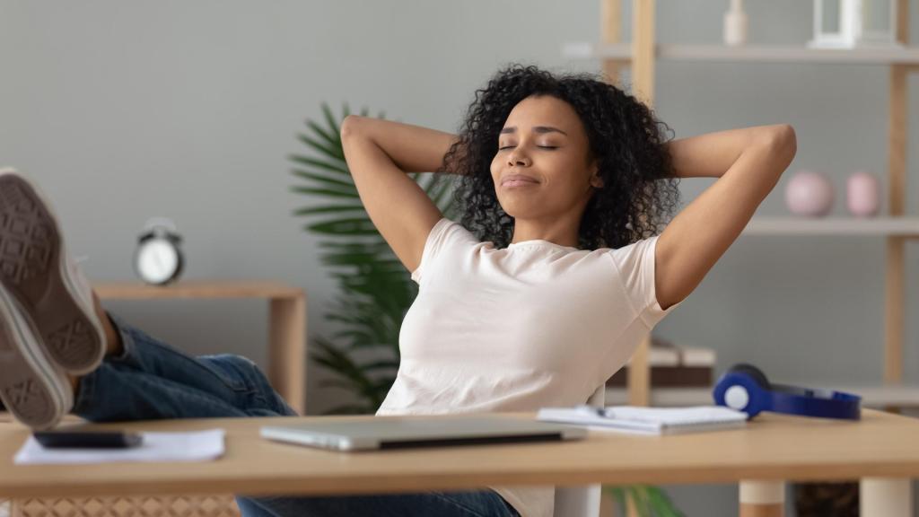 Relaxed woman leaning back in a chair