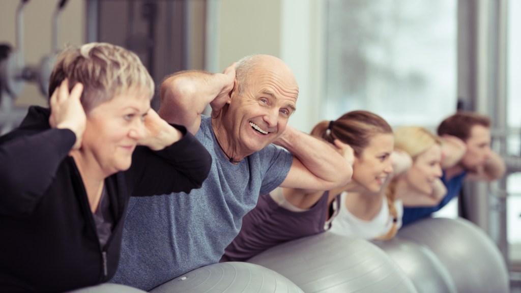 a group of people working out smiling