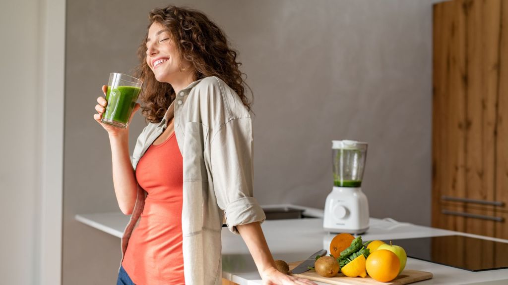 a lady drinking healthy shake